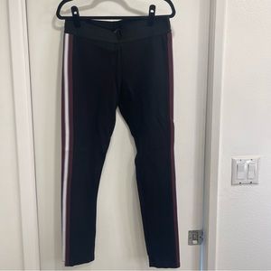 BCBGMaxAzria large black leggings. Side stripe